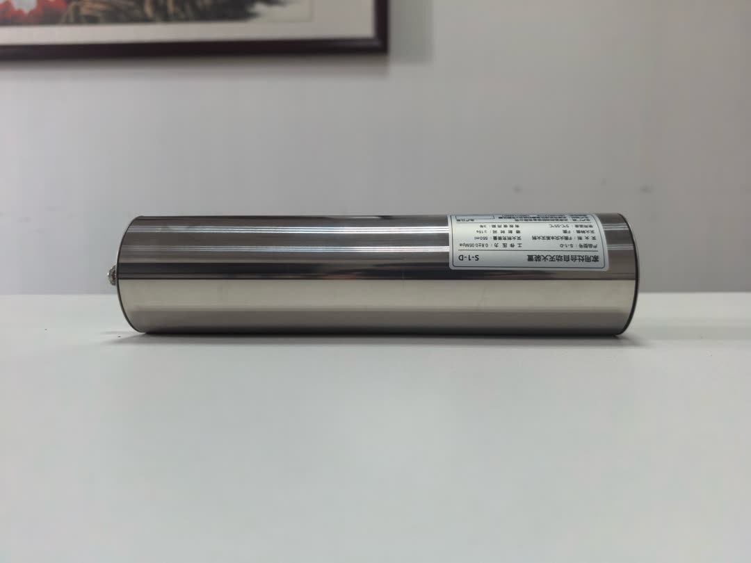 Polished stainless steel cylinder, front view